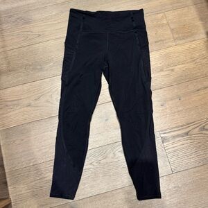 Athleta Vitality Stash Pocket 7/8 Tight in black size M